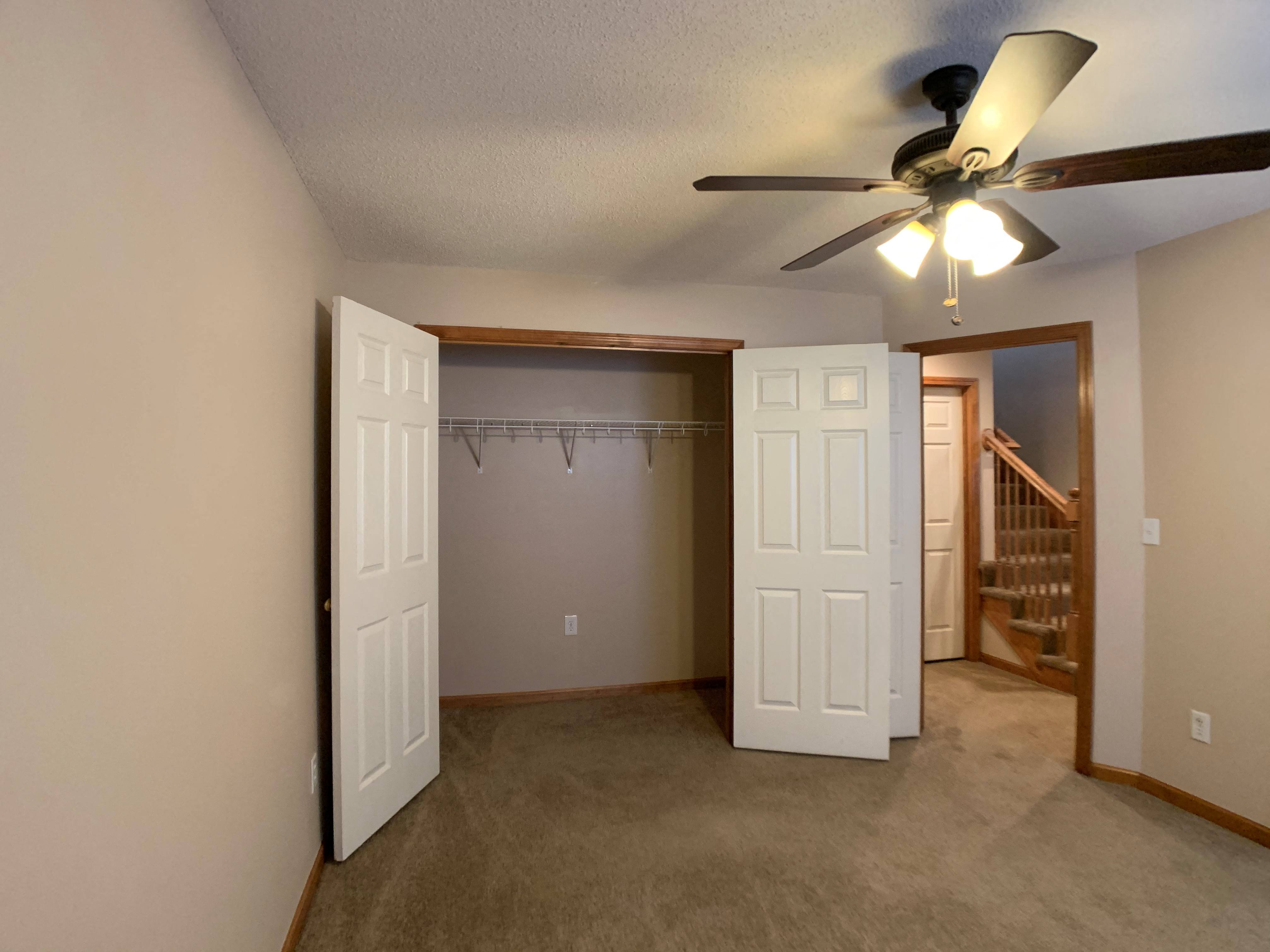 Second bedroom with large closet and doorway